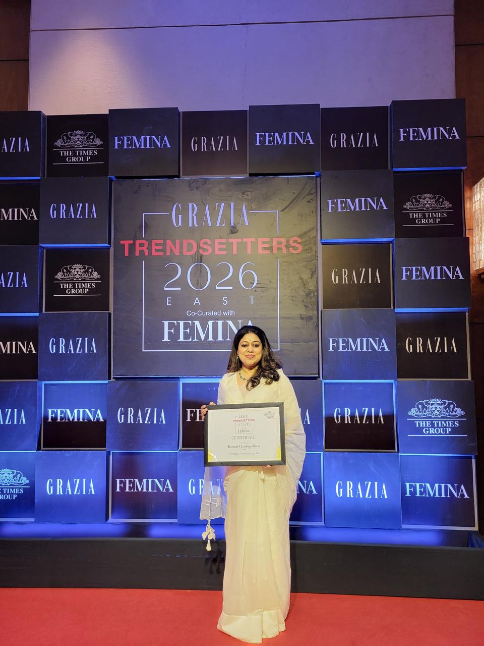 Barnali Chattopadhyay with her Grazia Trendsetters certificate at the awards backdrop